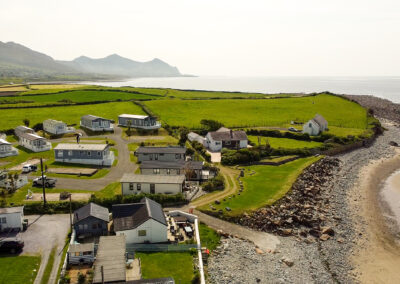 Aerial view of West Point Beach Resort beside the coast - West Point Beach Resort
